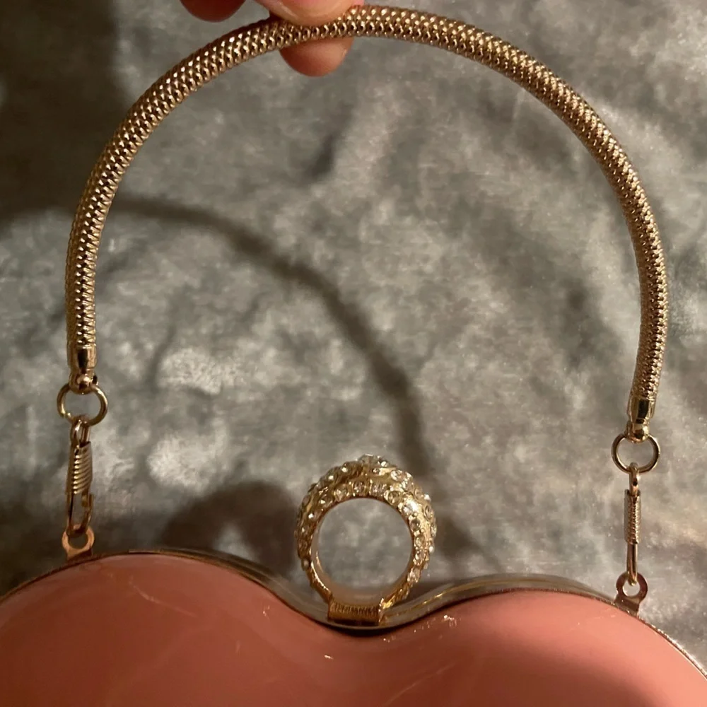 Heart-Shaped Pink Clutch with Gold Handle